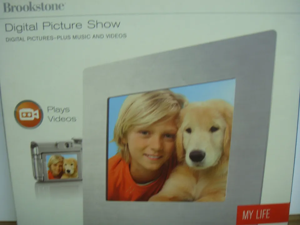 brookstone-digital-picture-show-10-inch-digital-photo-frame-with-video-music-and image 1